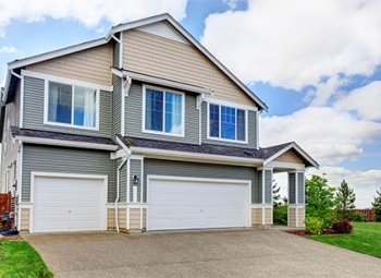 Residential Roof Installation of a white color house in Gresham, OR