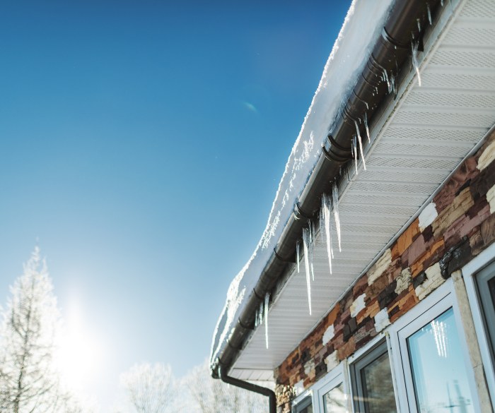Damaged House Roof Due to Icicles in Oregon